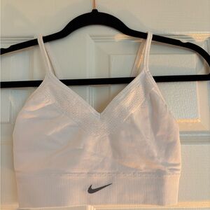 Nike White Sports Bra with V-neck Design and Soft Stretchy Fabric